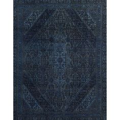 a blue rug with an intricate design on the center and sides, in dark colors