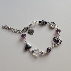 Purple Heart Beads Bracelet, Adjustable Purple Metal Beaded Bracelets, Purple Metal Beaded Bracelets, Purple Beaded Metal Bracelets, Purple Crystal Beaded Bracelets As Gift, Purple Metal Beaded Bracelets As Gift, Purple Glass Bracelets As Gift, Purple Metal Beaded Bracelet As Gift, Purple Glass Bracelets For Gifts