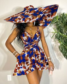 Description: African print infinity Romper/Shorts can be worn in more than 10 different ways 2 side pockets Elastic Back Made with high quality African print wax fabric 100% Cotton Designed and made in the USA NOTE: The hat is sold separately. Care Instruction: HAND WASH IN COLD WATER USE MILD DETERGENT Chitenge Outfits, Modern African Clothing, Printed Bridesmaid Dresses, African Print Jumpsuit, Kente Print, Best African Dresses, African Inspired Clothing, African Wedding Dress, African Inspired Fashion