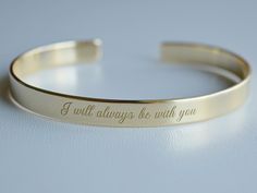 "Gold plating comes in varying levels of quality, largely depending on the thickness and purity of the gold coating. Our Gold plated bracelets are coated with 22K gold and the thickness of the gold layer is 0.5 microns (it's sufficient even for jewelry pieces that are exposed to rough wear). - Gold plated bracelet engraved with your chosen message. - The thickness of gold plating is around 0.5 microns - Text, coordinates, numbers or handwriting outside and inside the cuff - The color doesn't wea Minimalist Engraved Bangle Cuff Bracelet, Adjustable Minimalist Engraved Bangle, Everyday Engraved Bangle Cuff Bracelet, Minimalist Adjustable Engraved Bangle, Minimalist Engraved Bracelet For Promise, Minimalist Engraved Name Bangle Bracelet, Minimalist Engraved Promise Bracelet, Minimalist Engraved Adjustable Cuff Bracelet, Minimalist Adjustable Jewelry With Engraved Text