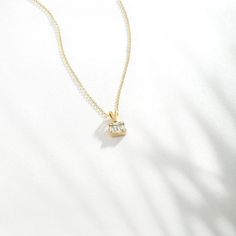 "Remember that diamonds are a girl's best friend when the diamond is too precious to wear. Keep them close, especially around your neck. F E A T U R E S * Made to Order. * Gold KT: 14K * Choice of Gold Color: Yellow Gold, White Gold * Gem Stone: Genuine Diamond * Diamond-Cut: Round * Diamond Carat: 0.18 ct * Pendant Height: 5 mm / 0.19 in * Pendant Width: 5 mm / 0.19 in * Diamond Color-Clarity: H Color, SI Clarity * Length: 14\", 16\", 18\" * Setting Type: Baguette Cut * Ready to Ship in 1-3 Bus Gold Baguette Cut Solitaire Necklace, 14k Gold Diamond White Baguette Cut Diamond Necklace, Fine Jewelry Solitaire Baguette Cut Necklace Gift, Gold Necklace With Single Baguette Cut Diamond, White Gold Solitaire Necklace With Baguette Cut For Gift, Anniversary Solitaire Necklace With Baguette Diamonds, Gold Baguette Cut Single Diamond Necklace, Gold Baguette Cut Necklace With Single Diamond, Baguette Cut Solitaire Necklace In White Gold For Gift