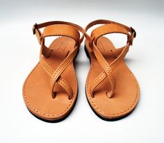 These sandals are custom made to order. Please contact me in case you have narrow or wide feet. You can customize each pair in the available colors or you can contact me for more details. Women sandals pictured in natural tan. They are made from Greek thick cow leather making them very strong. SIZES Please visit the last image of this listing in order to follow the instructions on how to measure your feet. Available women's sizes EU Size 35 - USA Size 4 (9.25 inches/23.5 cm sole length) EU Size Clothing Capsule, Satin Ballet Flats, Tan Leather Sandals, Nice Sandals, Leather Sandals Handmade, Handmade Sandals, Shoe Pattern, Leather Sandals Women, Shoe Obsession