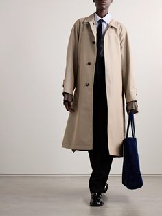 Maison Margiela's trench coat is designed with a smooth satin lining that extends out passed the cuffs to create a cool, deconstructed feel. It's made from cotton-blend gabardine and has a partially concealed placket and double back vents. Use the long buckle-fastening belt to cinch in the loose shape. Margiela Trench Coat, Timeless Gabardine Outerwear For Spring, Classic Long Single Breasted Raincoat, Classic Long Single-breasted Raincoat, Classic Long Gabardine Raincoat, Elegant Raincoat For Workwear In Fall, Elegant Long Raincoat For Fall, Elegant Long Fall Raincoat, Classic Gabardine Raincoat For Work