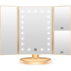 the lighted vanity mirror has three mirrors on it