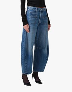 Aptly named, the Horseshoe jean is fashioned with a curved, wide leg that falls to slightly tapered and cropped, frayed hems. This oversized silhouette looks great with a sleek tank. Horseshoe Jeans, Maxi Jumpsuit, Perfect White Tee, Jumpsuit Jacket, Favorite Daughter, Oversized Silhouette, Everyday Dresses, Citizens Of Humanity, Bag Dress