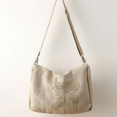 Bohemian Beige Shoulder Bag With Floral Embroidery, Embroidered Beige Shoulder Bag For Travel, Travel Embroidered Beige Shoulder Bag, Embroidered Beige Satchel For Everyday Use, Embroidered Beige Tote Shoulder Bag, Embroidered Crossbody Shoulder Bag For Everyday Use, Beige Embroidered Canvas Bag For Everyday, Floral Embroidered Beige Shoulder Bag For Everyday Use, Everyday Floral Embroidered Hobo Shoulder Bag