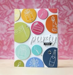 a birthday card with buttons on it and the words party time written in white ink