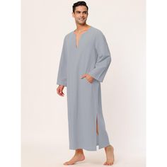 There is a pocket on the front for storing small items, which is convenient and practical. Made of soft fabric, it will be comfortable to wear, and you can enjoy leisure and sleep time at home. The long-sleeved gown is designed with a V-neck and pullover style for easy wearing and taking off. This nightshirt is suitable for beaches, holidays, festivals, home wear, and daily casual wear. Machine Wash Cold Inside Out. Model Body Size: Height: 6'1", Chest: 38 2/8 inches, Waist: 30 6/8 inches, Hip: Comfortable Sleepwear With Pockets For Home, Cotton Sleepwear With Pockets For Relaxation, Solid Cotton Sleepwear With Pockets, Comfortable Solid Color Sleepwear With Pockets, Comfortable Solid Sleepwear With Pockets, Sleepwear With Pockets, Sleeved Gown, Sleep Time, Long Night