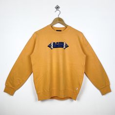 Vintage Roxy Crewneck Sweatshirt Print Logo Orange Color Women’s M by OzzyVintageShop on Etsy Yellow Casual Top With Ribbed Cuffs, Casual Yellow Top With Ribbed Cuffs, Yellow Crew Neck Casual Sweater, Yellow Casual Crew Neck Sweater, Yellow Cotton Sweater For Streetwear, Casual Yellow Crew Neck Sweater, Sporty Yellow Crew Neck Sweater, Yellow Cotton Crew Neck Sweater, Casual Yellow Sweater With Letter Print