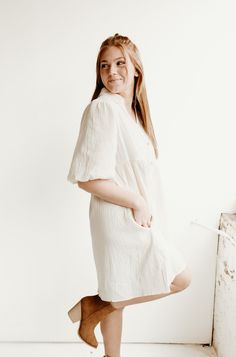 Be airy, fairy light with our Cream colored Puffed Sleeved Light Linen Dress. Perfect for all spring and summer occasions, as well as Easter! The elasticized puffer sleeves can be styled up or down, while the button front adds a touch of charm. Complete your look with cowgirl boots or sandals. Spring Dresses With Balloon Sleeves For Casual Occasions, Spring Dresses With Balloon Sleeves For Dress Down Occasions, Spring Balloon Sleeve Dress Down Dresses, Casual Puff Sleeve Dress With Balloon Sleeves For Daywear, Summer Balloon Sleeve Mini Dress For Brunch, Casual Puff Sleeve Dress For Spring, Casual Summer Puff Sleeve Dress With Gathered Sleeves, Casual Puff Sleeve Dress With Balloon Sleeves For Spring, Spring Puff Sleeve Dress With Balloon Sleeves For Brunch