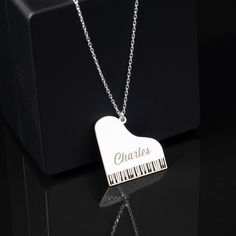 "Custom Piano Necklace in Sterling Silver, Piano Keyboard Pendant is made by hand in our workshop with care. All our jewelry is the most elegant choice for the Bridesmaids, friends, your loved ones and for yourself. Custom Piano Necklace in Sterling Silver, Piano Keyboard Pendant * Material: High Quality Solid 925 Sterling Silver. * Finish: Sterling Silver ∙ Gold ∙ Rose Gold. * All our jewelry is custom made by hand with care in our workshop.  HOW TO ORDER ❓ * Select your necklace COLOR. * Choos Piano Necklace, Piano Player, Piano Keyboard, Name Necklace, Solid 925 Sterling Silver, Sterling Silber, Gold Rose, Jewelry Gift, Or Rose