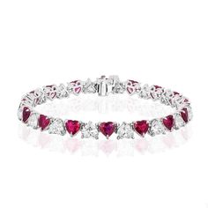 For Sale on 1stDibs - Gorgeous and Unique Ruby and Diamond Bracelet. 16 Heart Shaped Rubies weighing 10.20 Carats. 16 Heart Shaped Diamonds weighing 8.15 Carats. Set in Platinum. Diamond Heart Cut Brilliant Bracelet, Diamond Heart Bracelet With Brilliant Cut, Diamond Heart Cut Bracelet With Brilliant Cut, Luxury White Gold Diamond Heart Bracelet, Luxury White Gold Heart Bracelet With Diamonds, Luxury Diamond Heart Bracelet, Luxury Cubic Zirconia Bracelet For Valentine's Day, White Gold Diamond Heart Bracelet For Wedding, Anniversary White Gold Heart Bracelet With Brilliant Cut