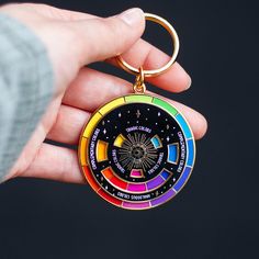 Our best-selling design since its introduction in April 2020! The Original Color Wheel© Interactive Spinner Enamel Keychain is a design loved by artists, makers, and designers. Made for the creative souls among us, this keychain stands out as a delightful gift choice, celebrated by art and graphic design educators, students, and anyone passionate about exploring color theory. Designed as a playful yet thoughtful token, this interactive keychain boasts a spinning top layer that adds an element of Interactive Keychain, Keychain Design Ideas, Graphic Design Teacher, Keychains Ideas, Pins Design, Enamel Keychain, Gold Keychain, Keychain Black, The Color Wheel