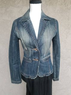 "PRE LOVED Upcycled denim vest with huipil from Guatemala, huipil is 100% handmade by Mayan women. The huipil is made with 100% cotton, Silk and organic dye. Size S Approximate Measurements Shoulder 14.5\" Waist 34\" around Lenght 22\" Sleeves 223\" long 14\" wide Be aware that this is a handmade piece, small imperfections are part of this art piece." Fitted Distressed Dark Wash Outerwear, Stonewashed Cotton Denim Jacket For Fall, Spring Stonewashed Cotton Outerwear, Fall Stonewashed Cotton Denim Jacket, Spring Recycled Denim Fitted Jacket, Spring Fitted Recycled Denim Jacket, Stonewashed Dark-wash Cotton Outerwear, Fitted Recycled Denim Outerwear With Pockets, Fitted Recycled Denim Jacket With Pockets