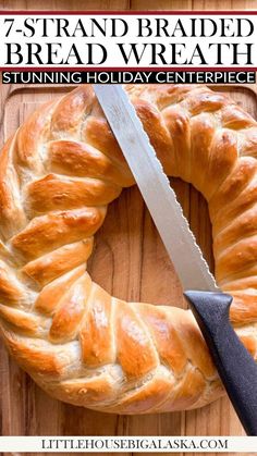 a loaf of bread on a cutting board with a knife in it and the words 7 strand braid bread at the top