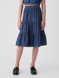 Soft denim midi skirt.  Elasticized waist.  Tiered skirt.  Responsibly Made: This denim skirt is part of our water-saving Washwell program.  Compared with conventional wash methods, Washwell uses at least 20% less water and has saved over a billion liters of water since 2016.  Easy pull-on waist.  Easy through the hip and thigh.  Hits below the knee. Denim Skirt, Toddler Boys, Skirt Medium, Water Saving, Denim Midi Skirt, Gap Kids, Tier Skirt, Tiered Skirt, Midi Skirt