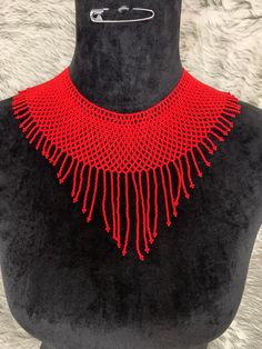 All our pieces are genuine and each necklace is handcrafted by artisans from the most representative areas of huichol art.We only have one piece of each style, choose the choice or style you like and only choose 1 amount of each style you want, thank you. Artisan Festival Choker Necklace, Gift Red Handwoven Beaded Necklaces, Large Beads Pendant Necklace, Handmade Red Beaded Choker Necklace, Handmade Red Long Necklace, Handmade Long Red Necklace, Red Handwoven Necklace For Gift, Unique Round Beads Choker, Red Artisan Handwoven Jewelry