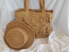 Raffia circle bag and hat Casual Straw Bucket Sun Hat, Adjustable Bucket Straw Hat For Beach, Casual Woven Bucket Straw Hat, Casual Adjustable Natural Straw Bag, Vacation Bucket Hat With Woven Detail, Adjustable Straw Bag For Travel, Natural Bucket Sun Hat For Vacation, Natural Color Bucket Sun Hat For Beach, Casual Natural Color Bucket Sun Hat