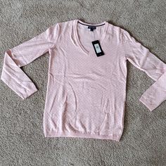 New With Tags Tommy Hilfiger Pink Long Sleeve Shirt. Size Xs. Bust 16.5 Inches, Waist 15 Inches, Hips 14.5 Inches. Tommy Hilfiger V-neck Tops, Fitted Tommy Hilfiger V-neck Tops, Tommy Hilfiger Fitted V-neck Tops, Fitted V-neck Tommy Hilfiger Tops, Casual Tommy Hilfiger V-neck Top, Tommy Hilfiger Casual V-neck Top, Pink Long Sleeve Shirt, Tommy Hilfiger Tops, Pink Long Sleeve