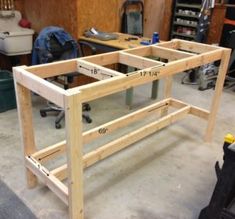 the table is being built and ready to be used as a workbench or bench