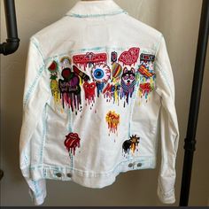 Levis Hand-Painted White Denim Jacket With Patches New Without Tags Casual White Outerwear With Patches, Trendy Graffiti Print Denim Jacket For Spring, Multicolor Denim Jacket With Patches For Spring, Casual Denim Jacket With Graffiti Print For Fall, Multicolor Graphic Print Denim Jacket, Multicolor Patched Denim Jacket For Spring, Multicolor Graphic Print Long Sleeve Denim Jacket, Trendy Spring Outerwear With Graffiti Print, Artsy Long Sleeve Denim Jacket For Fall