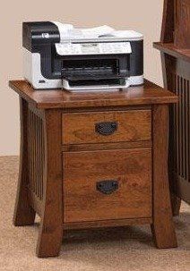 a desk with a printer on top of it and a chair in the back ground