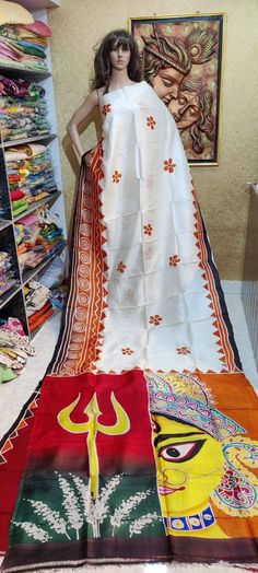 This design based on the Traditional Maa durga drawing art work mix colour work over the saree with two half color body work. With maa durga drawing work with sewliful(sewli flower) Feel the Original Murshidabadi/Bishnupu Silk, It comes with hand paint design by the artist, Every painting 🎨🖌dedicated to the nature story of Indian art, forest, trees, animals, and also the flavor of every culture expect of our Indian tradition, Not only the design the yarn cultivation to the processes of it's al Kalamkari Print Choli For Puja And Navratri, Multicolor Salwar Kameez For Puja And Navratri, Diwali Block Print Blouse Piece For Puja, Block Print Blouse Piece For Puja And Diwali, Block Print Blouse Piece For Diwali Puja, Navratri Puja Choli With Kalamkari Print, White Tussar Silk Blouse For Navratri, Navratri Puja Kalamkari Print Choli, White Tussar Silk Saree With Traditional Patterns