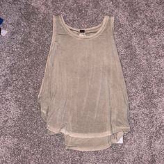 Free People Tank Top - Green Size Xs Nwt. The Cut On The Side Of The Shirt Goes Low (Second Photo) Casual Beige Tank Top For Everyday, Basic Khaki Summer Tops, Basic Khaki Tops For Summer, Beige Casual Relaxed Fit Tank Top, Casual Beige Relaxed Fit Tank Top, Casual Khaki Cotton Tank Top, Free People Tank Top, Free People Tank, The Shirt