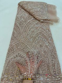 This high quality Fabric is measured in 5 Yards With Embroidered Beading and Sequin. It is soft, very delicate and beautiful. This high Quality Fabric is made with Fashion embroidered rhinestones can be used in making party wedding dresses, skirts, shawls, scarves and other other fashion apparels as you would like. Size : Length : 5 yards (180 inch). Width: 50 inch (Please allow slight deviation for the measurement data ,±1 inch) Material: 100% Polyester, Tulle Lace Fabric, Eco-Friendly embroide Designer Dress, Sequin Fabric, Tulle Lace, Wedding Party Dresses, Luxury Fabrics, White Silver, Lace Fabric, Party Wedding, Dress Making