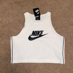 Nwt Nike Sz L Crop Tank White With Black Swish Logo Tight Fit Stretch Nike White, White Nikes, Nike Tops, Crop Tank, Nike Women, White Black, White And Black, Tights, Womens Tops