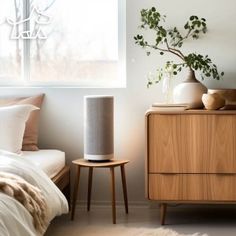 an image of a bedroom setting with the bed and nightstand in front of the window