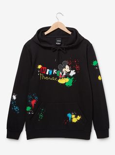 Add some color to your next Disney Parks look with this Mickey Mouse-inspired hoodie! Featuring a portrait of the cartoon mouse beside embroidered lettering of his name  this jacket includes paint splatter details along the front and back. With a front pocket and drawstring hood  this sweatshirt is perfect for fans of Mickey.A BoxLunch Exclusive!60% cotton; 40% recycled polyesterListed in unisex sizesWash cold with like colors; dry lowDo not iron over printImported Disney Cotton Hoodie With Drawstring, Disney Cotton Hoodie With Drawstring Hood, Black Mickey Mouse Hoodie, Black Mickey Mouse Hooded Hoodie, Disney Mickey Mouse Hooded Hoodie, Disney Cotton Hoodie For Streetwear, Disney Mickey Mouse Hoodie, Fall Mickey Mouse Sweatshirt For Streetwear, Disney Letter Print Sweatshirt For Streetwear