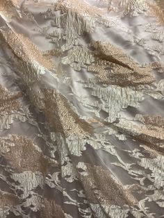 "THIS IS luxurious mulberry 100% organza jacquard brocade design in Italy COLOR: Champagne gold WIDTH :60\" inch made in Italy LENGHTE ; SOLD EVERY YARD MULTIPLE YARDS ARE ONE CONTINUOUS CUT CARE : DRY CLEAN ONLY NEED MORE THAN 20 YRDS AND UP PLEASE SEND US EMIL AND WE CAN ACCOMMODATE YOU SO YOU CAN COMPLETE YOUR PARTICULAR PROJECT DISCLAIMER : WE HAVE MADE AN AFFORT TO PROVIDE FABRICS IMAGES THAT COLSELY REPRESENT THE FABRICS HOWEVER DUE TO ALL THE POSSIBLE VARIANTS (e,g,light source monitor qu Cream Embroidered Fabric For Festive Formal Occasions, Festive Cream Embroidered Fabric For Formal Occasions, Festive Jacquard Embroidered Fabric For Wedding, Elegant Jacquard Fabric For Evening, Elegant Pink Embroidered Fabric For Festive Occasions, Elegant Jacquard Fabric For Wedding, White Silk Embroidered Fabric For Party, Elegant Pink Tissue Silk Embroidered Fabric, Gold Embroidered Fabric For Festive Evening