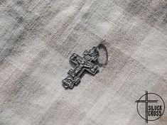 "On the front side of the 925 silver greek orthodox cross there is an image of the crucifix of Jesus Christ surrounded by saints. At the bottom of the cross necklace is the inscription \"NIKA\". On the reverse of the cross is the inscription \"Save and Preserve 2000 years\" (2000 years from the date of the Christianization of Rus). Christogram (chrismon) is depicted in a small circle under the inscription. It is a chi rho - monogram of Christ consisting of 2 Greek letters X and P. The letters of Symbolic Engraved Crucifix Jewelry, Silver Symbolic Crucifix Jewelry And Charms, Spiritual Hallmarked Crucifix Jewelry And Charms, Engraved Spiritual Cross Jewelry And Charms, Engraved Spiritual Cross Charms And Jewelry, Spiritual Engraved Cross Pendant Jewelry, Spiritual Silver Crucifix Jewelry And Charms, Engraved Spiritual Cross Pendant Jewelry, Silver Spiritual Crucifix Jewelry And Charms