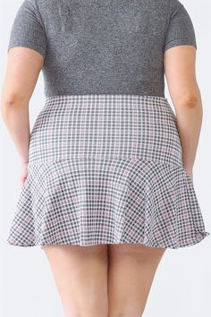 🖤 Flaunt your curves in our Plus Size Pink Plaid High Waist Flare Hem Mini Skirt. With a fun and flirty flare hem, this skirt accentuates your figure while adding a playful touch to any outfit. Perfect for a day out with friends or a night out on the town. Get ready to turn heads! 🖤 Item Features: Pink, plaid, high waist, flare hem, mini length, semi-stretchy, unlined, not see through, casual, cute, girlish, stylish. Flirty Mini Skirt With Ruffle Hem, Spring Skirt With Stretch And Flared Hem, Spring Stretch Skirt With Flared Hem, Casual Fitted Skirt With Flared Hem, Flirty Lined Mini Skirt, Flirty Flared Flowy Skirt, Stretch Skort With Ruffle Hem, Flirty Stretch Skirt With Ruffle Hem, Flirty Mini Hem Lined Skirt