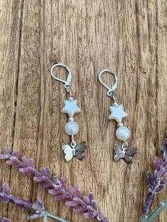 These are a dangling style silver toned earrings that are accented with beads. Easy to wear and fast shipping! String Jewelry, Wire Wrapped Jewelry Tutorials, Themed Jewelry, Wrapped Jewelry, Butterfly Charm, Bead Stringing, Bead Earrings, Jewelry Tutorials, Wire Wrapped Jewelry