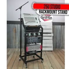 a recording equipment stand with microphone and sound board