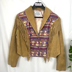 Vintage Suede Fringe Southwestern Jacket Lariat Leathers Brand Suede Jacket With Fringe Down The Front And Back With A Button Closure And One Inside Pocket. This Jacket Shows Signs Of Wear Mostly On Back Of Sleeves And Wrists Picture. Size: Xl Approximate Measurements Lying Flat: 23.5” Pit To Pit 22.5” Long Southwestern Jacket, Coats Vintage, Crystal Belt, Vintage Suede, Suede Fringe, Suede Jacket, Picture Size, Inside Pocket, Jackets & Coats