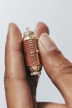 Yellow Gold Box Locket, Enameled and Set with Diamonds, Showing The Inscription "vivons heureux, vivons caches", and Hiding a Red Enamel Heart Set On a "trembleuse". This Locket Is on a 73cm Rathi Link That Can Be Worn In a Doubloe Loop. Marie Lichtenberg, Enamel Locket, Celine Daoust, Heart Place, Gold Locket Necklace, Jewelry Lockets, Olympia Le Tan, Gold Locket, Gold Box