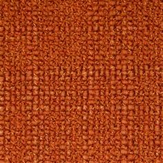 an orange fabric textured with small squares