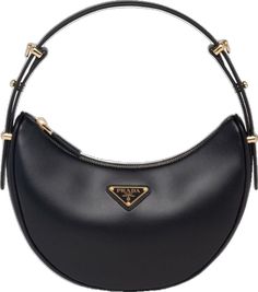 Formal Calf Leather Shoulder Bag With Gold-tone Logo Plaque, Modern Black Bag With Gold-tone Logo Plaque, Black Modern Bag With Gold-tone Logo Plaque, High-end Black Shoulder Bag With Gold-tone Hardware, Elegant Shoulder Bag With Metal Logo For Travel, Luxury Shoulder Bag With Metal Logo, Modern Formal Shoulder Bag With Gold-tone Logo, Formal Leather Shoulder Bag With Gold-tone Logo, Sleek Shoulder Bag With Gold-tone Hardware For Travel