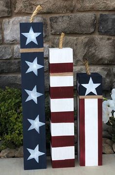 two wooden blocks with stars and stripes painted on them