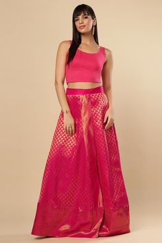 Pretty in Pink! A beautiful wrap around skirt that is made from silk with gold zari. The Gauri Pink Saree Skirt is your answer for casual ethnic appeal. The skirt is wrap around so where it with ease and share it with sisters! The length is ankle length but may be customized as per your preference. Product Features: Color: Pink Fabric: Silk Work: Zari Occasion: Festivewear Product Type: Saree Skirt Disclaimer: There will be slight difference in digital to actual image, props displayed on models Saree Skirt, Bridesmaid Sarees, Reception Sarees, One Minute Saree, Sequins Saree, Ethnic Saree, Formal Saree, Saree With Belt, Floral Print Sarees