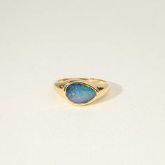 Blue Australian Opal Doublet Signet ring, Solid Gold signet ring, Fire opal Ring, October ring, australian opal ring, Gift ring for her,  Available in 9k/14k/18k yellow, rose or white gold as well as in Sterling silver Same design can be made also with other custom gemstones per request.  Product details: - Solid gold - Australian Opal Doublet - 1.8ct (Top Quality) - Made to order - 8 to 10 business days. Ring size - US 3 to US 9 (for smaller or larger ring size, please contact) Please select yo Opal Signet Ring, Fine Jewelry Opal Promise Ring With Polished Finish, Formal Opal Ring With Polished Finish, Opal Rings With Polished Finish For Formal Occasions, Formal Opal Rings With Polished Finish, Formal Blue Opal Rings, Signet Ring Women, Opal Gold Ring, Australian Opal Ring