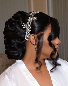 a woman wearing a wedding hair comb