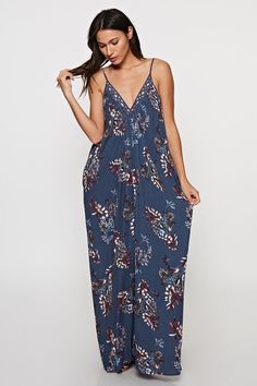 Are You Summer Ready? A beautiful and versatile sleeveless maxi dress in a floral print. Featuring adjustable spaghetti straps, an oversize cocoon fit, an embroidered trim v neckline, and side pockets. Great Resort Wear! Stay Sexy! Fabric: 100% Rayon Unlined Maxi Dress For Brunch, Printed V-neck Rayon Maxi Dress, Unlined Bohemian Maxi Dress, Flowy Casual Maxi Dress With Floral Embroidery, Floral Embroidered Sundress Maxi Dress For Vacation, Casual Floral Embroidered Maxi Dress For Spring, V-neck Rayon Maxi Sundress, Rayon V-neck Sundress Maxi Dress, Casual V-neck Maxi Dress With Floral Embroidery