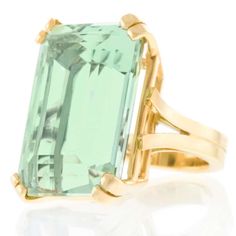 For Sale on 1stdibs - Circa 2020, 18k, by Lawrence Jeffrey, American. Impeccably designed to feature its delicately hued 54.14 carat Green Beryl, this ring has a spectacular Luxury Formal Baguette-cut Topaz Ring, Luxury Topaz Baguette Cut Ring For Formal Occasions, Luxury Formal Baguette Cut Topaz Ring, Luxury Solitaire Emerald Ring For Formal Occasions, Luxury Green Topaz Gemstone Ring, Emerald Cut Gemstone Rings For Evening, Elegant Green Evening Rings, Luxury Faceted Topaz Ring, Luxury Faceted Rings For Formal Occasions