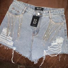 Rhinestone Light Wash Shorts Cowgirl Outfits Jean Shorts, Bedazzled Denim Bottoms, Casual Rhinestones Bottoms For Spring, Trendy Rhinestone Bottoms For Night Out, Denim Rhinestone Bottoms For Night Out, Trendy Bottoms With Rhinestone Fringe, Denim Bottoms With Rhinestones For Night Out, Trendy Rhinestone Fringe Shorts For Spring, Night Out Denim Bottoms With Rhinestones