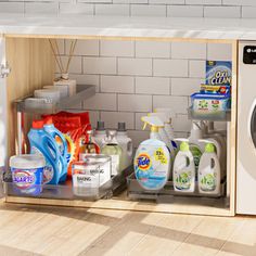 a washer and dryer sitting next to each other in front of a washing machine