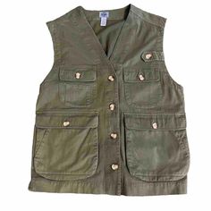 This Vest Is In Mint Condition Looks Brand New. It Is Vintage, And Even Though The Sizing Says Medium, I Would Say It Could Fit A Large Or Extra Large Person Very Comfortably Can Fit A Variety Of Sizes Depending On How You Would Like To Style It. Great Olive Green / Army Green Color Utility Cotton Sleeveless Tops, Khaki Sleeveless Utility Top, Spring Outdoor Vest Top, Utility Tops For Spring Outdoor, Casual Summer Vest For Outdoor Activities, Spring Cotton Vest For Outdoor Activities, Casual Khaki Cotton Vest, Spring Tops With Pockets For Outdoor Activities, 90s Style Tops With Pockets For Fall